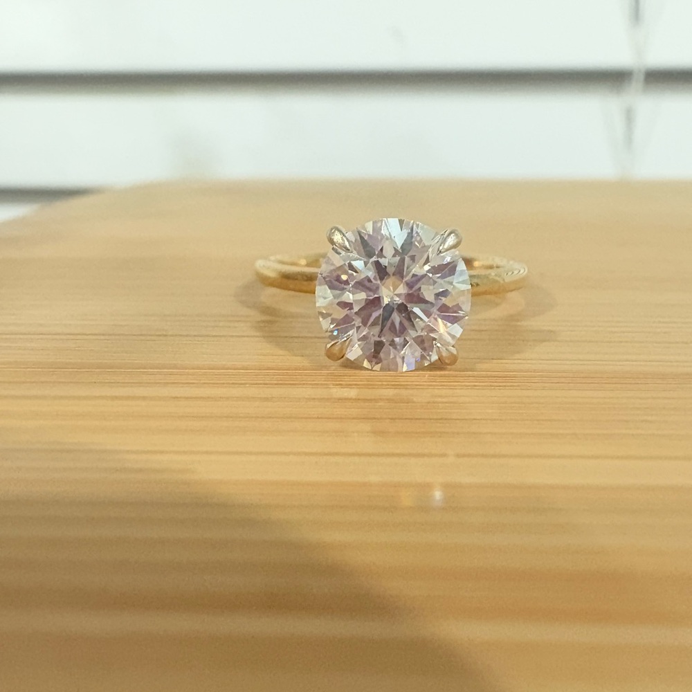 2.7 carat round moissanite engagement ring